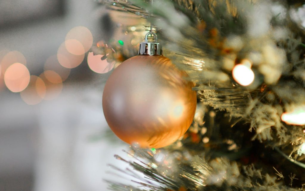 Gold Christmas Ornament on a Christmas Tree